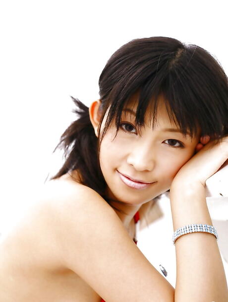 Luscious japanese young Sasa Handa in bikini exposing big hooters and sexy butt 