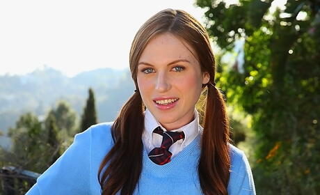 Sexy american redheaded young Kali Kenzington bares her ass in hot undies and spreads her legs outside