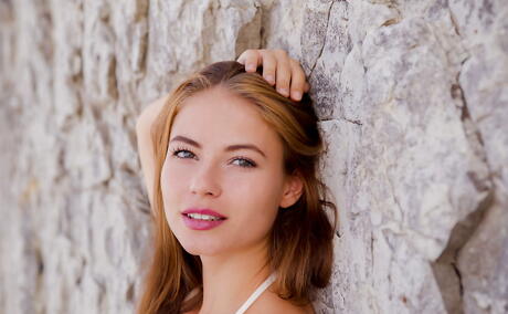 Sylphlike teen Hilary C in beautiful bikini baring her butt and shaved pussy outside