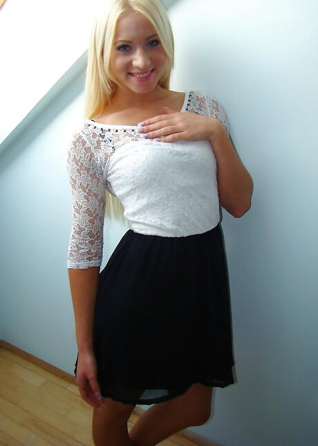 Foxy blonde teen Carrie in hot lingerie showing big titties and ass 