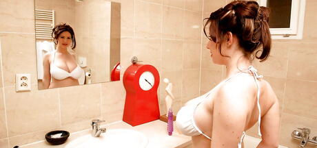 Seductive slovene milf Karina Hart exhibiting big boobs and playing with sex toy in shower