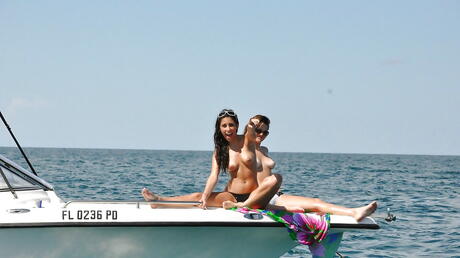 Hot girls Daniela Diamond and Tristan Berrimore showing hot bodies outdoor