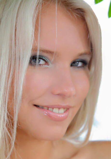 Glamorous blonde milf Katerina H in hot panties exposes big tits and bald pussy outside