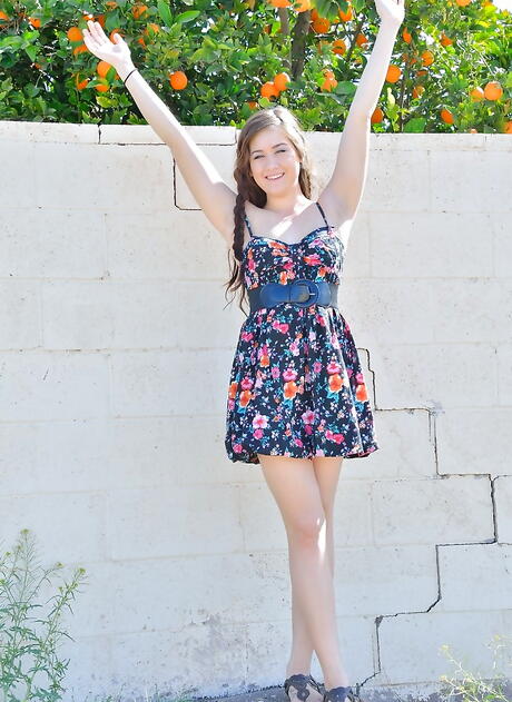 Svelte brunette teen Ashley Shannon showing her butt and loving sex toy outdoor