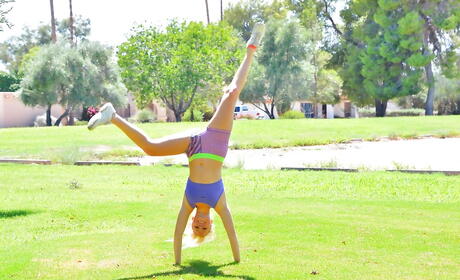 Stunning blonde youthful Megan in sexy shorts exposes tiny tits and loves dildo outdoor