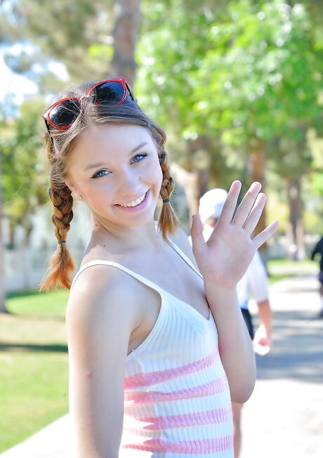 Slender russian teen Aurora Belle in skirt exposing tiny tits and shaved pussy outdoor