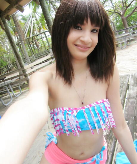 Stunning american teen Jessi Grey in hot bikini exposing small tits and hot ass outdoor