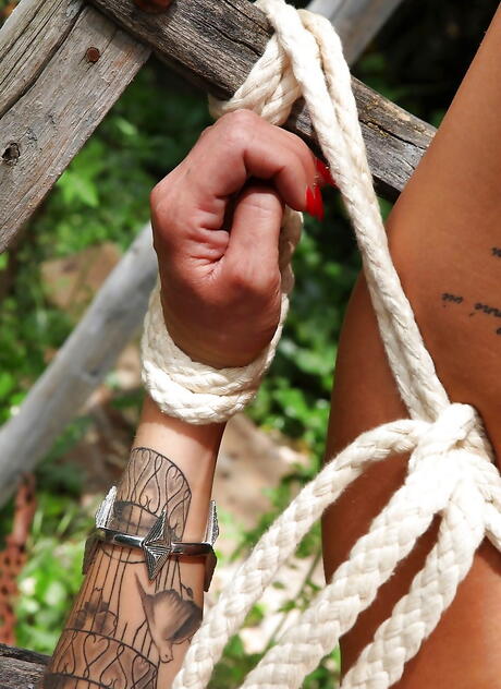 Curious french brunette wife Nikita Bellucci in hot fetish gallery outdoor