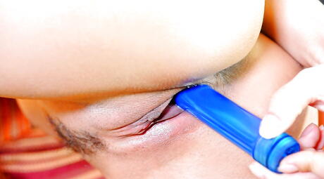 Facinating american brunette milf Eve Angel bares big tits and toys her snatch 