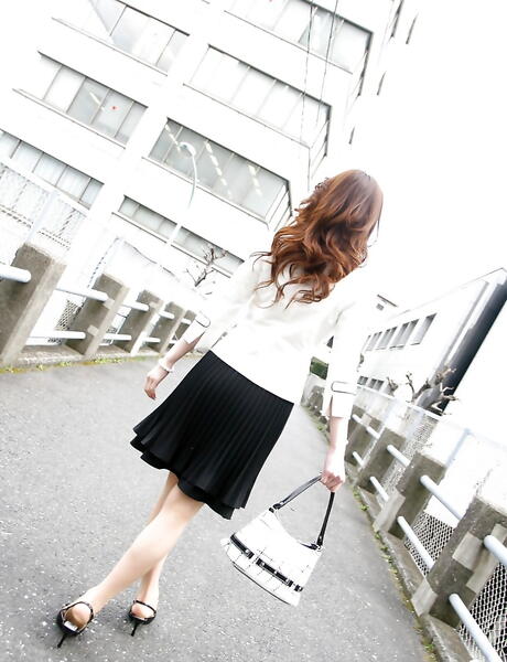 Svelte japanese teen Fumiko in fancy skirt work on rod 