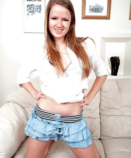 Gracile teen Nikki unveils small tits and sexy ass 