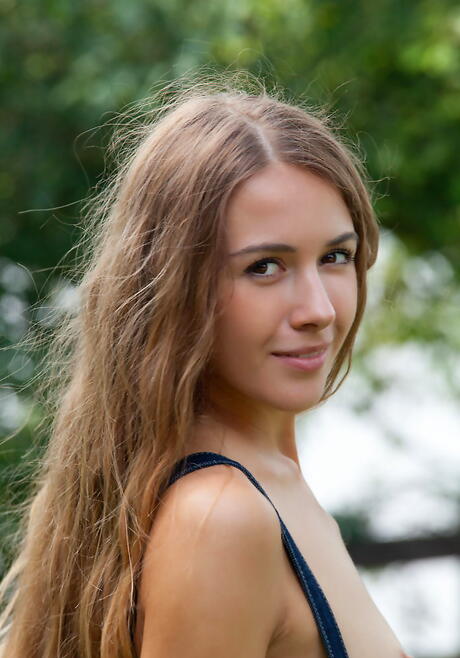 Hot blonde teen Lina Diamond in fancy shorts exposing small tits and shaved pussy outdoor