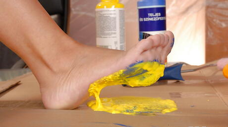 Sexy hungarian babe Eve Smile gives a foot job 