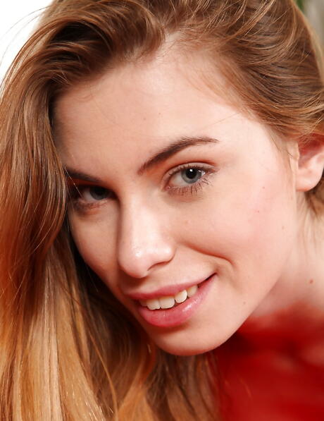 Very attractive teen Leana reveals tiny tits and puts a toy in her cunt 