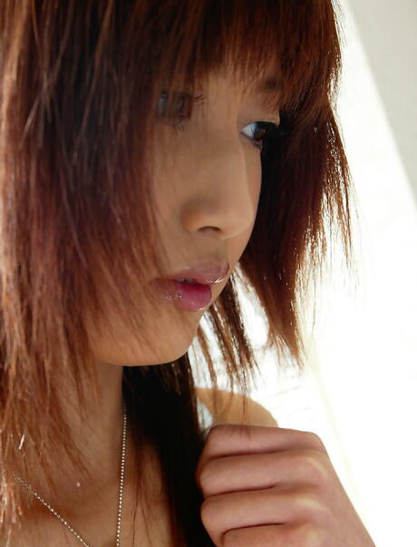 Stunning japanese teen Mio Komori exposing big tits and hairy pussy 