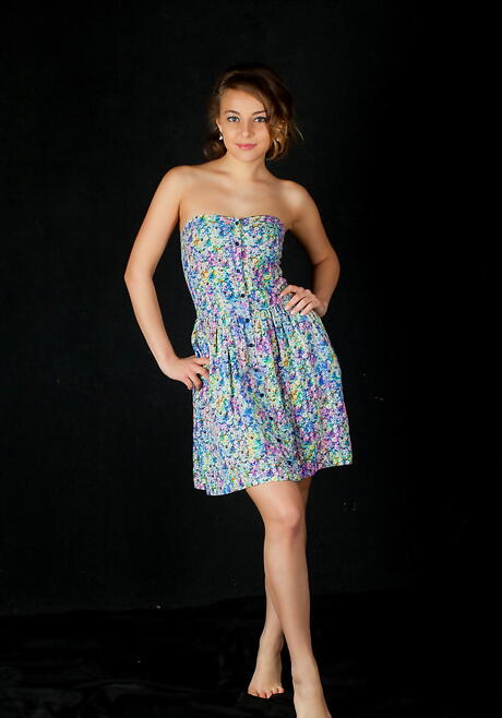 Sylphlike youthful Nikia A in sexy skirt exposes her ass 