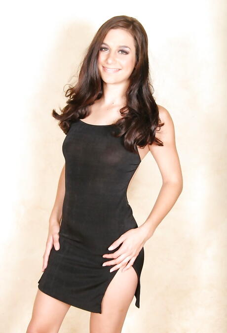 Sexy american dark-haired Jackie Ashe in sexy skirt reveals her ass 