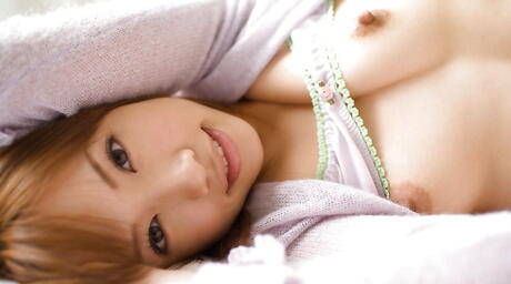 Gracile japanese youthful Reika Shina baring her ass 