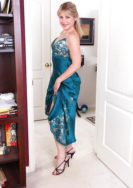 Excellent american mature Rebecca Hill in sexy skirt showing small tits and bald pussy 