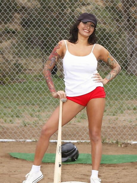 Enchanting american milf Ricki Raxxx in sexy shorts denudes big hooters and butt outdoor