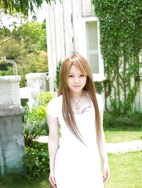 Superb japanese babe Ria Sakurai posing in lingerie on camera outdoor