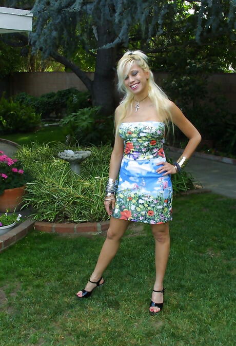 Very attractive philippine mature Alex Dane reveals big boobies and butt outdoor