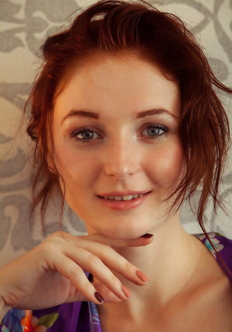 Rangy redheaded youthful Leona Honey exhibits tiny tits and spreads her legs 