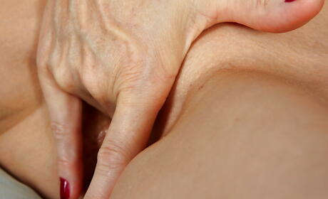 Excellent mature Melanie in nice skirt uncovers small tits and masturbates 