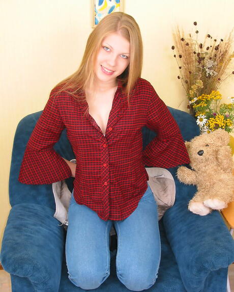 Slender teen Marina shows big knockers and spreads her legs 