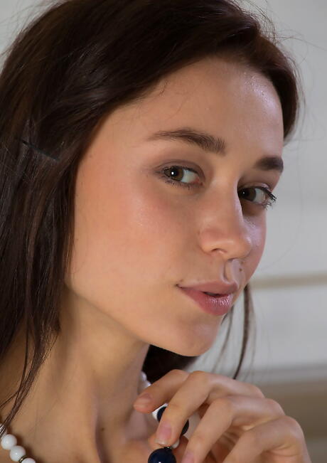 Stunning dark hair teen Valerie in fancy skirt shows tiny tits and bald pussy 