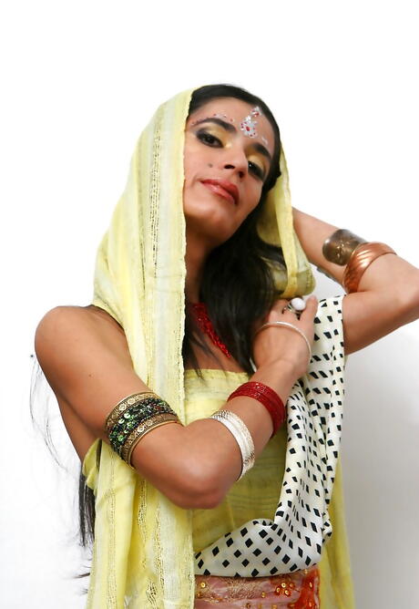 Curious indian cutie Tamara playing with toy 