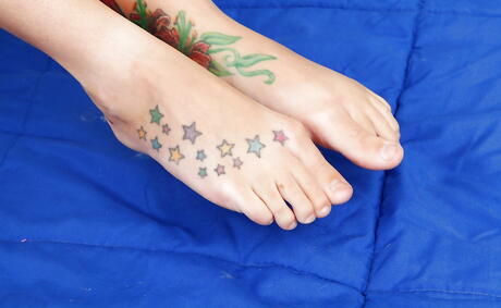 Excellent american young Sky Light in fancy shorts makes some foot fetish action 