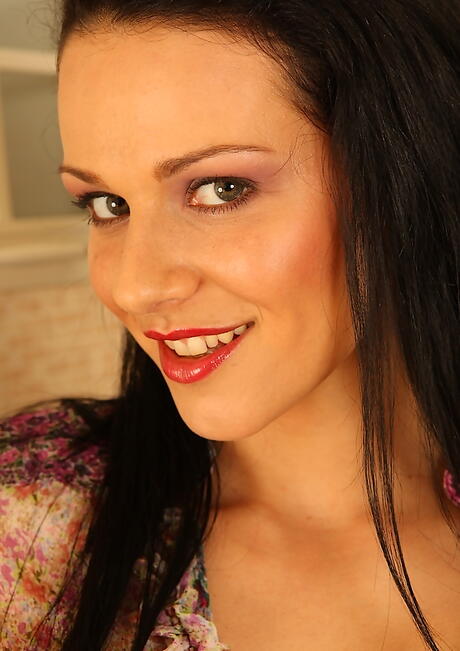 Sexy dark-haired milf Katty exhibits her butt in nice skirt and masturbates in the kitchen