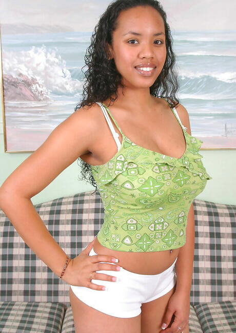 Lush dark hair youthful Dominique exhibits big boobies and spreads her legs 