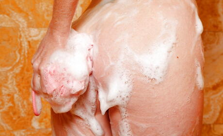 Charming american milf Jessica Rayne exposing big titties and jerking off in shower