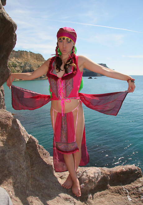 Luscious young Firebird A in uniform outfit exhibits big boobies and spreads her legs outdoor