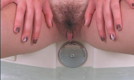 Excellent teen Ronnie in spreads her legs in bath