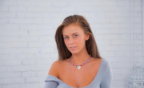 Sexy american teen Whitney Westgate in fancy shorts revealing big knockers and spreading her legs 