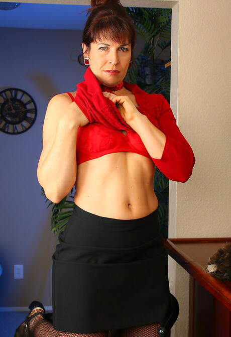 Sultry older Andie in hot lingerie unveils tiny tits and hairy pussy 