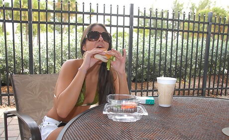 Stunning latin teen Moni in fancy shorts exhibiting her butt outside