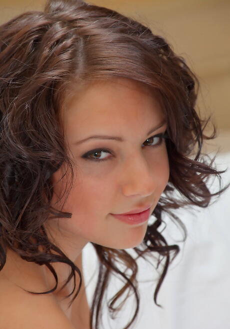 Luscious dark hair hottie Beatrice C in hot lingerie denudes tiny tits and shaved pussy 