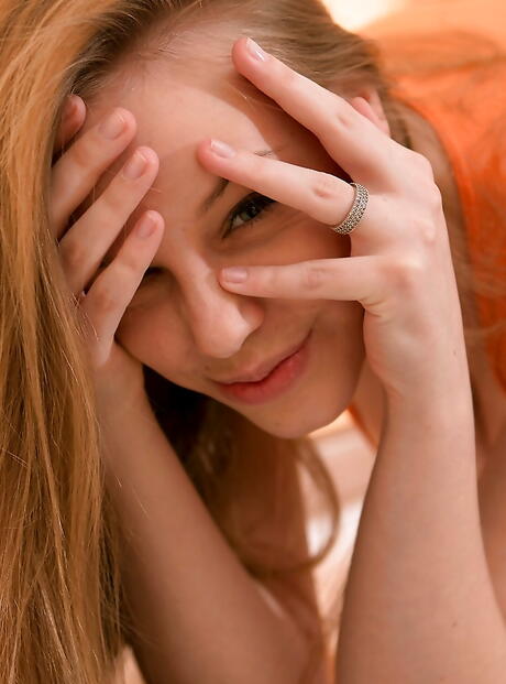 Peachy redhead hottie Mia in hot undies baring big knockers and nice pussy 