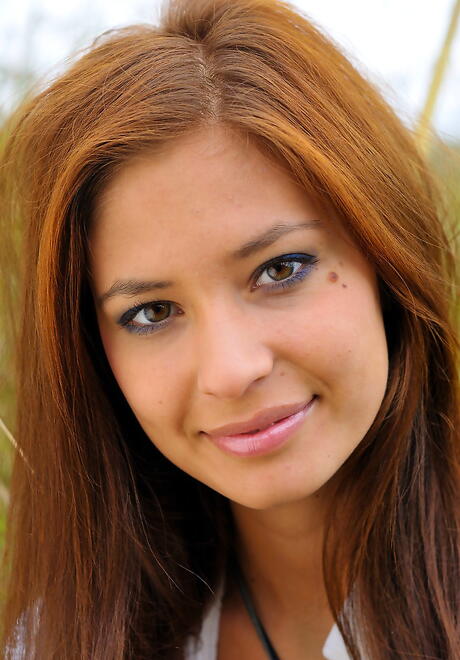 Very attractive teen Irina J loves foot fetish outdoor