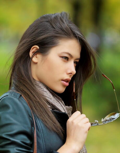 Sexy brunette youthful Jackie D exposes tiny tits and spreads her legs outside