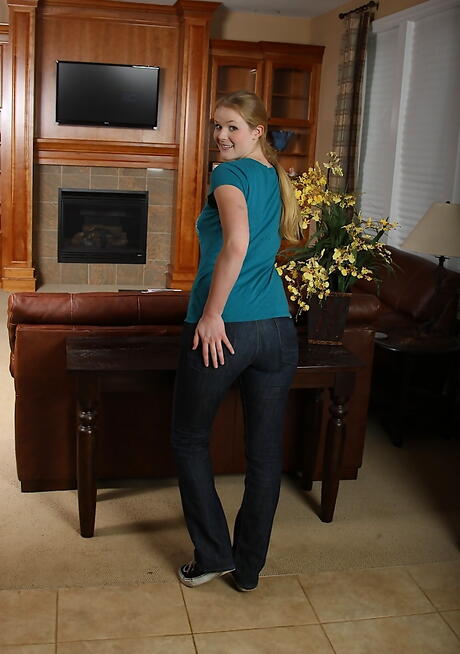 Sexy young Natalie Hawthorne revealing big boobs and spreading her legs 