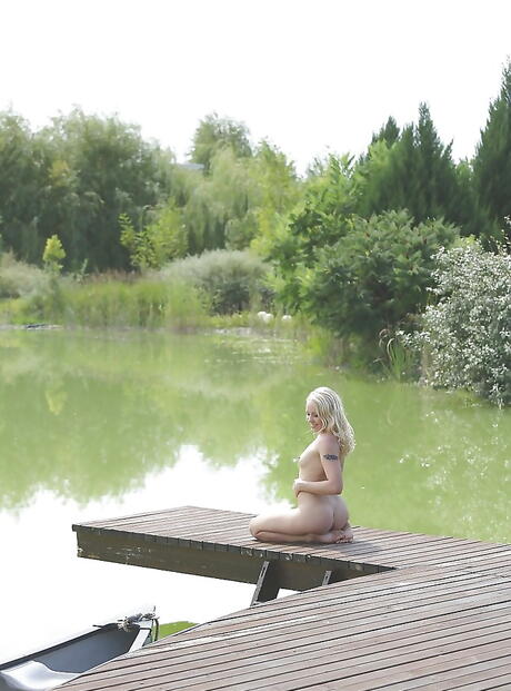 Excellent russian blond porn star Lola Taylor shows her butt in and jerks off 