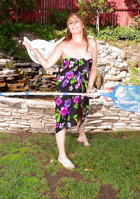 Very attractive american mature Cristine Ruby in nice skirt in nasty foot fetish outdoor