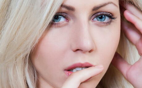 Excellent blonde teen Lija shows big hooters and shaved pussy 