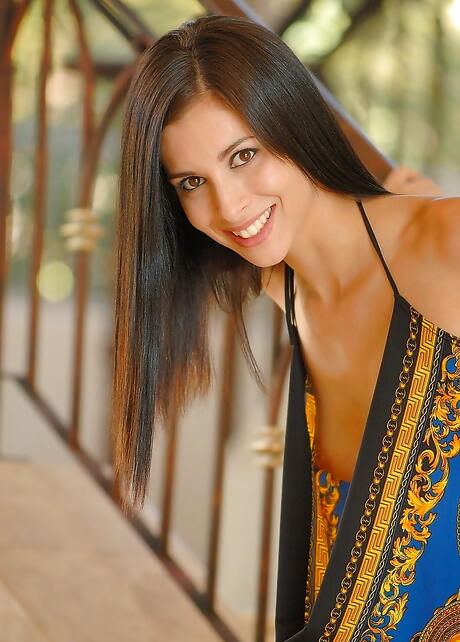 Sylphlike american dark-haired teen Tristan Kingsley in fancy skirt exposing her ass and spreading her legs 