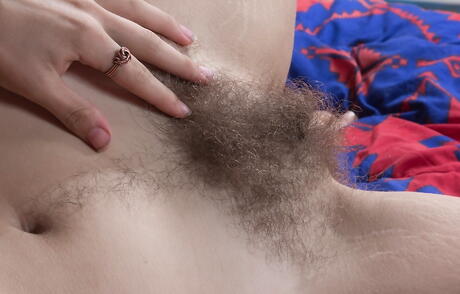 Charming babe Pixxy exhibiting big tits and hairy pussy 